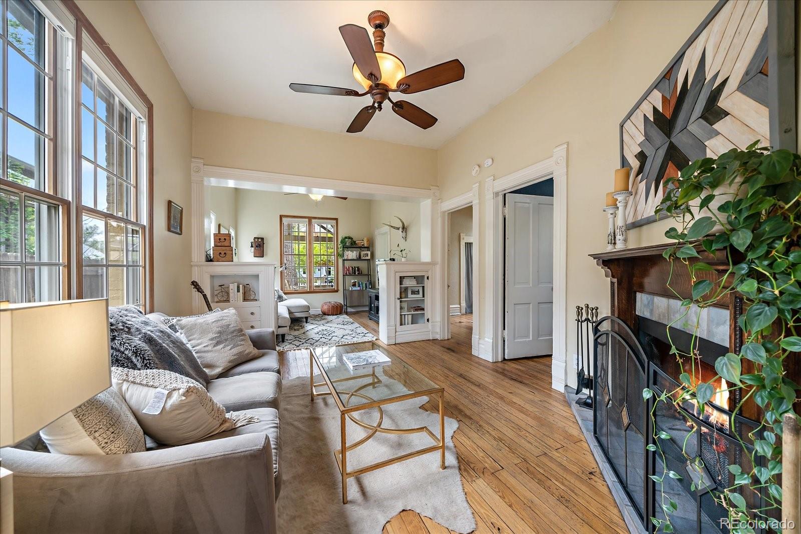 1776 South Logan Street Denver, CO 80210 - Photo 7 of 21 a living room with furniture