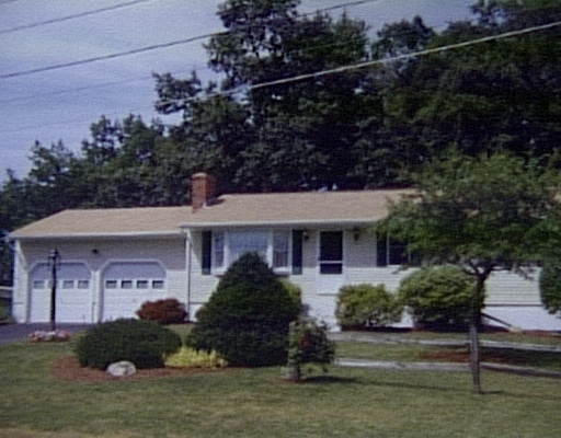 4 Blueberry Lane Rutland, MA 01543 - Photo 1 of 1 a front view of a house with a garden