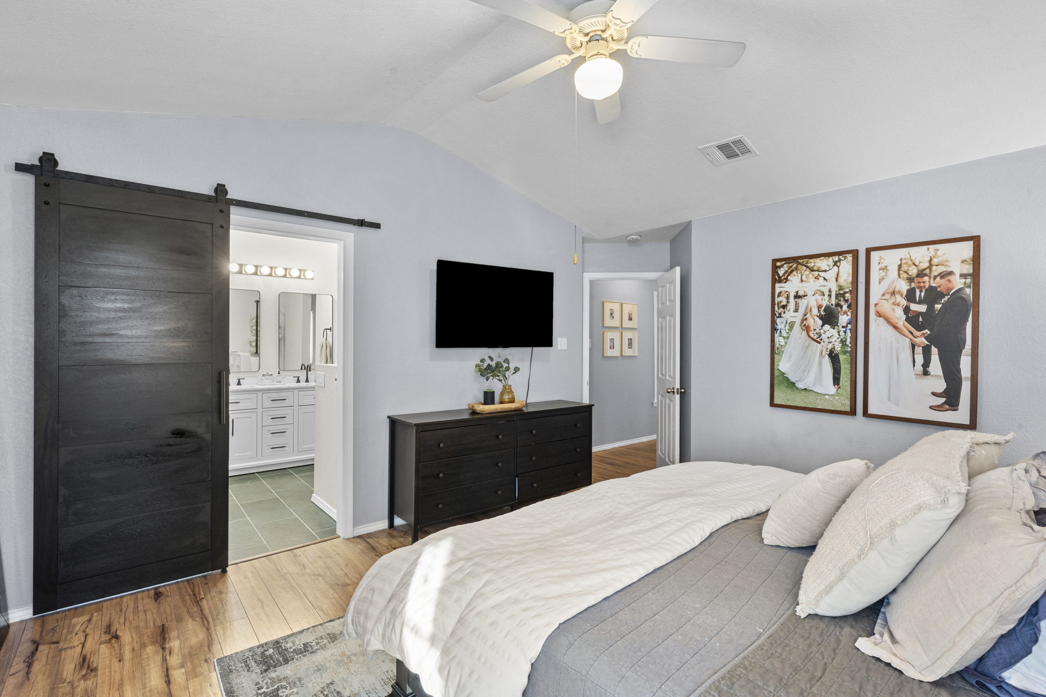 175 Wetzel Kyle, TX 78640 - Photo 12 of 40 Farmhouse door to primary bathroom