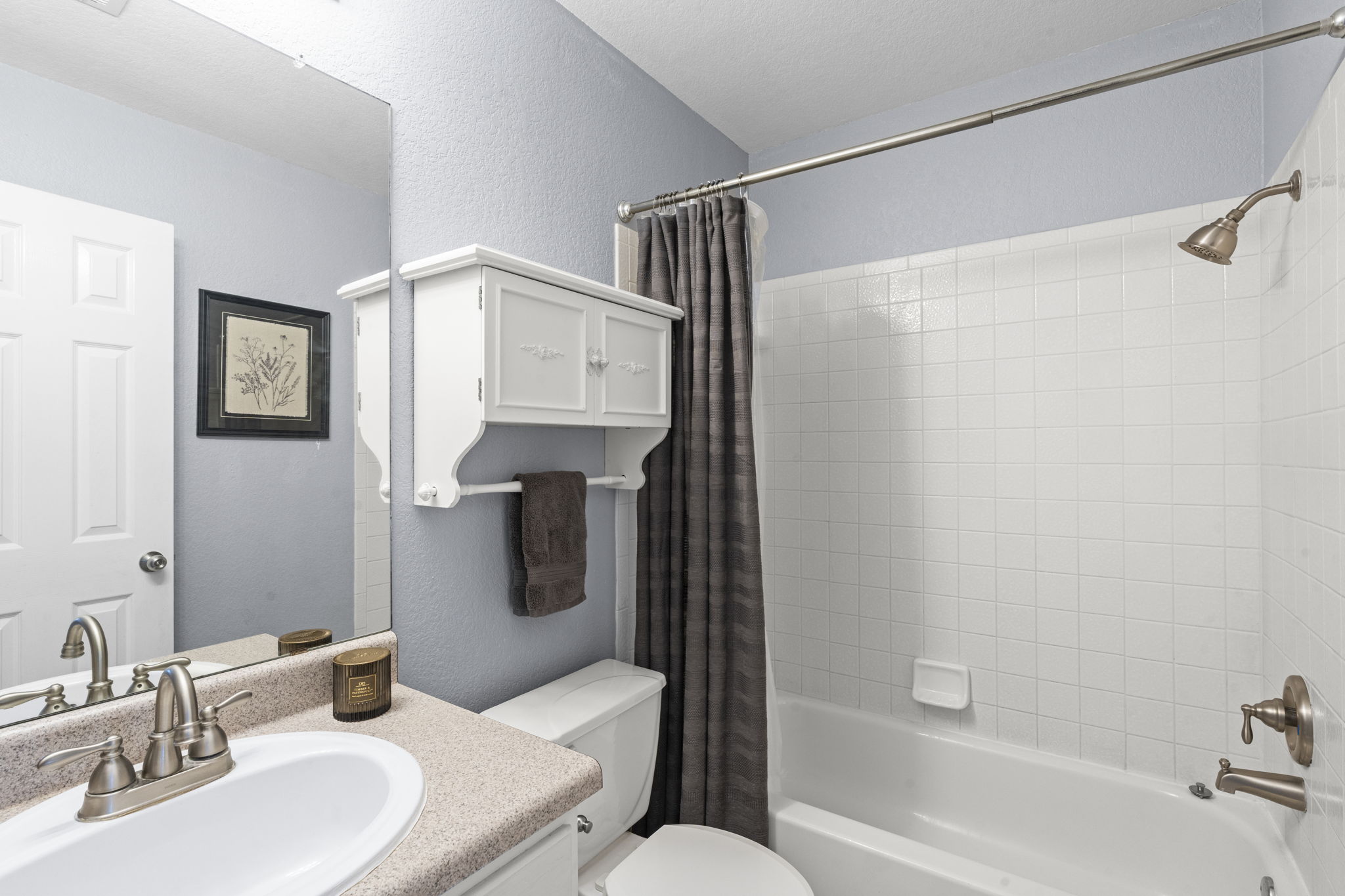 175 Wetzel Kyle, TX 78640 - Photo 18 of 40 Secondary bathroom with single vanity and shower/tub combo