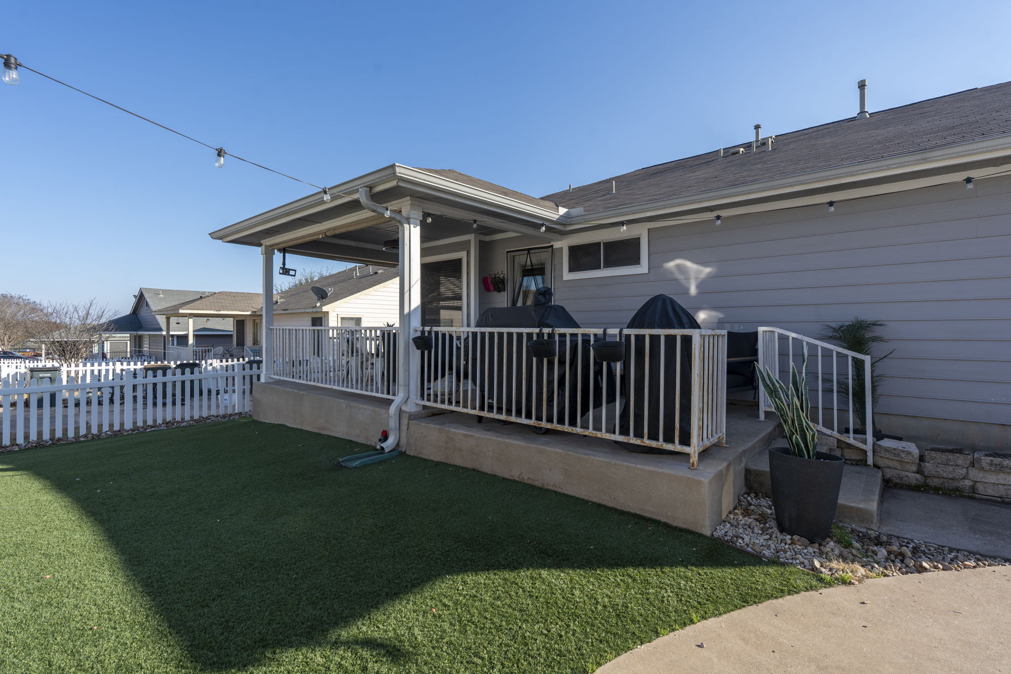 175 Wetzel Kyle, TX 78640 - Photo 25 of 40 View of the back of the home and covered extended patio