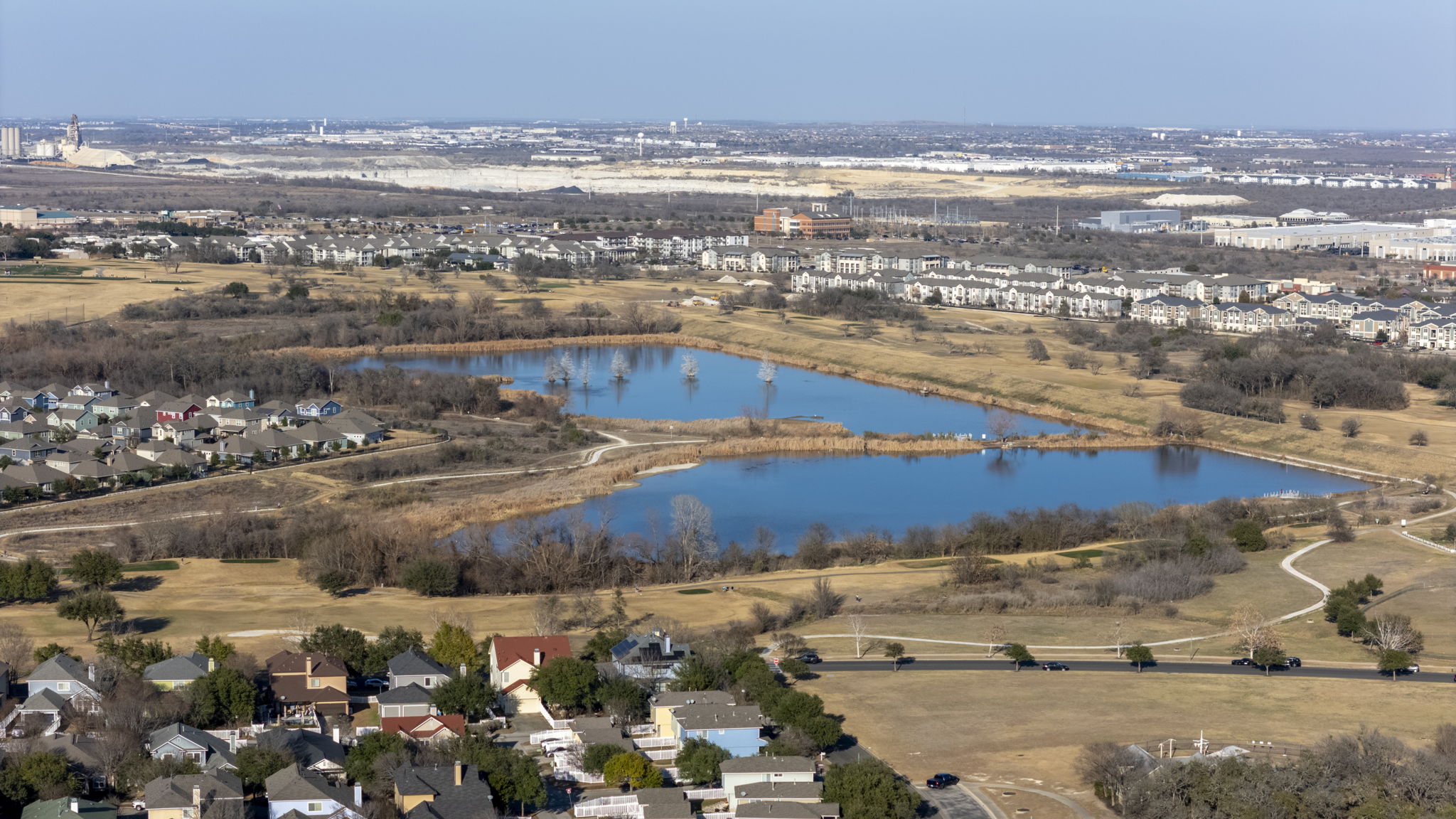 175 Wetzel Kyle, TX 78640 - Photo 37 of 40 Neighborhood pond, walking trails and golf course