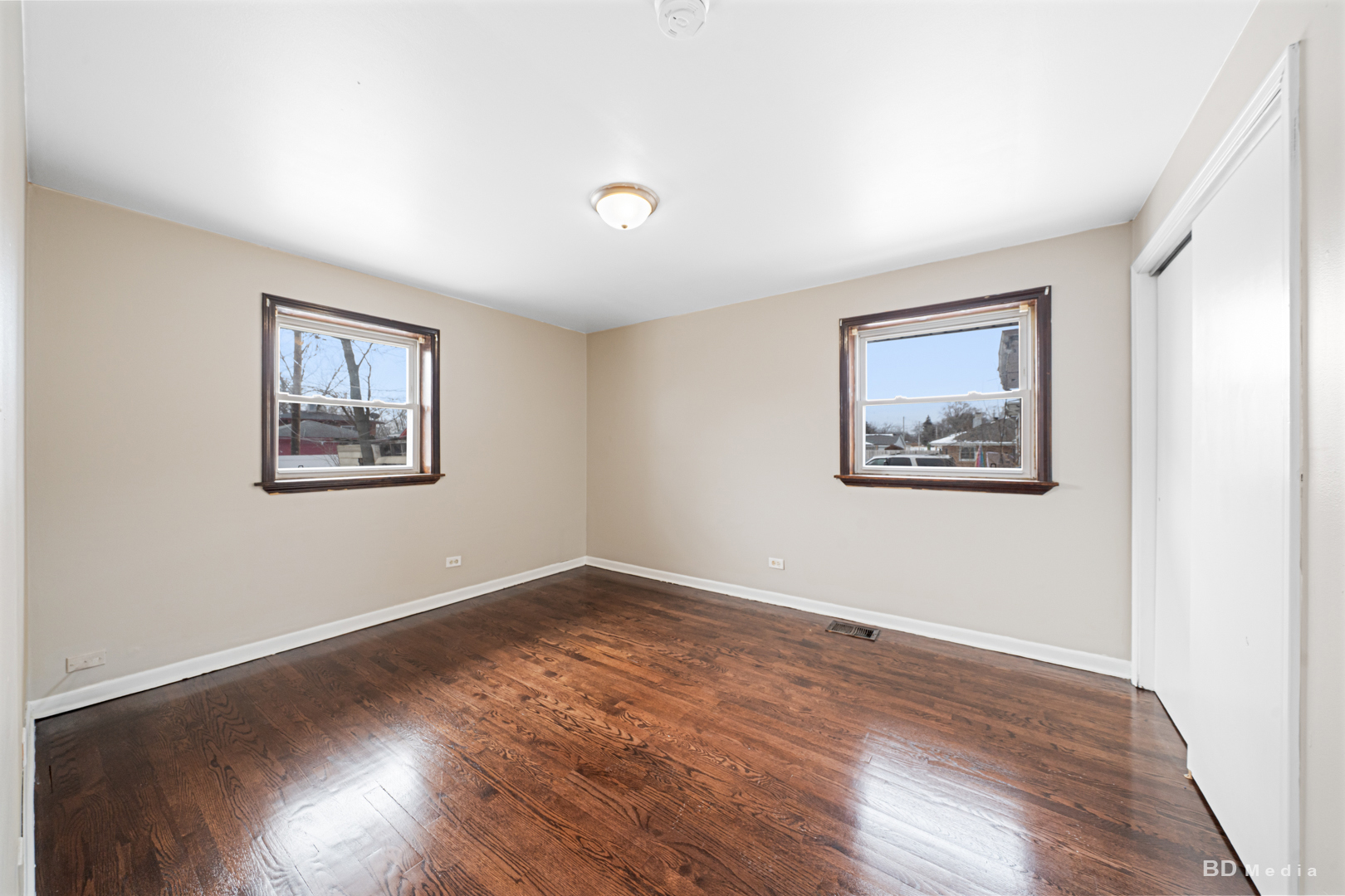2223 West 156th Place Markham, IL 60426 - Photo 11 of 19 a view of empty room with wooden floor