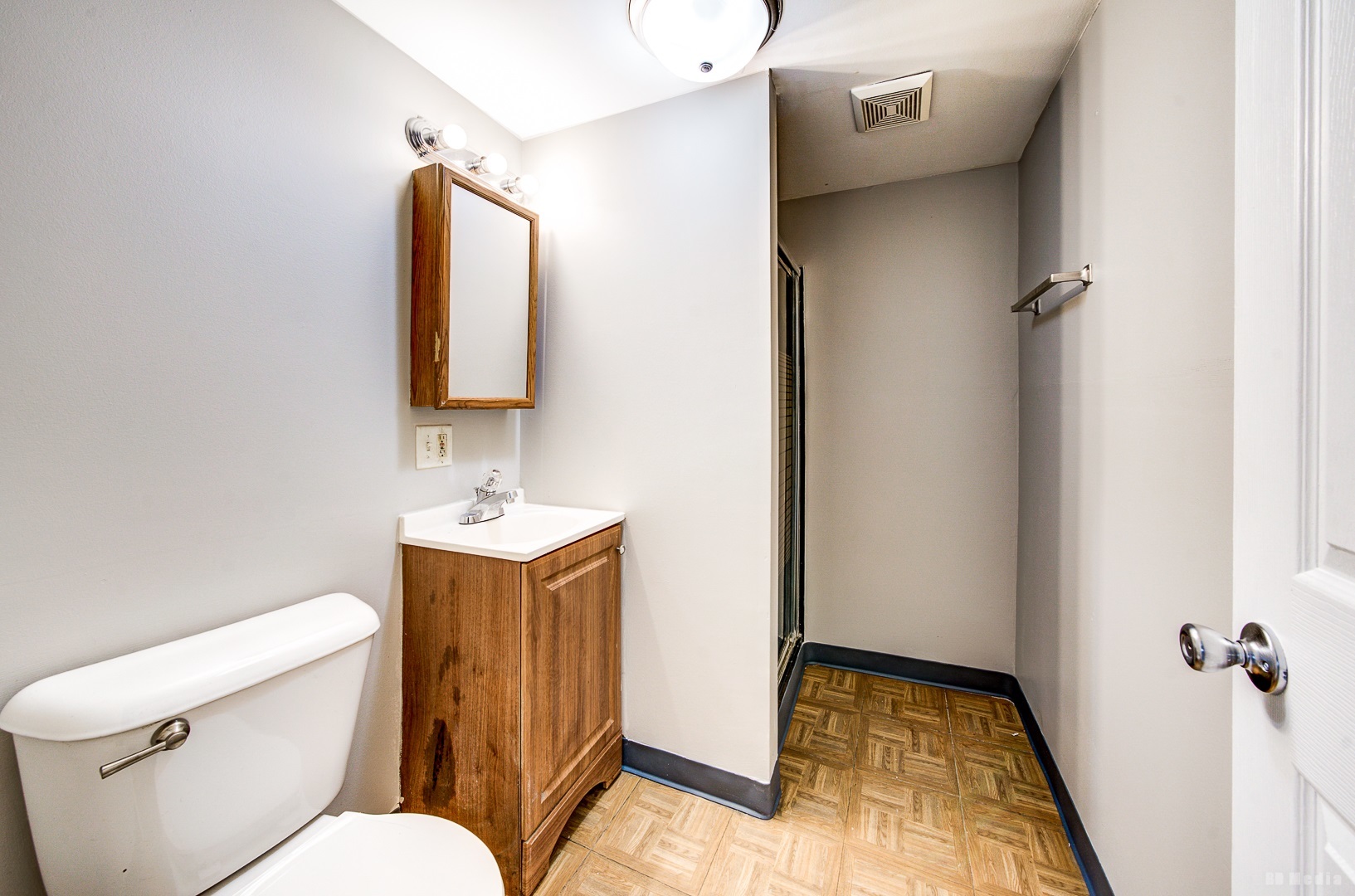 2223 West 156th Place Markham, IL 60426 - Photo 15 of 19 a bathroom with a sink mirror vanity and toilet