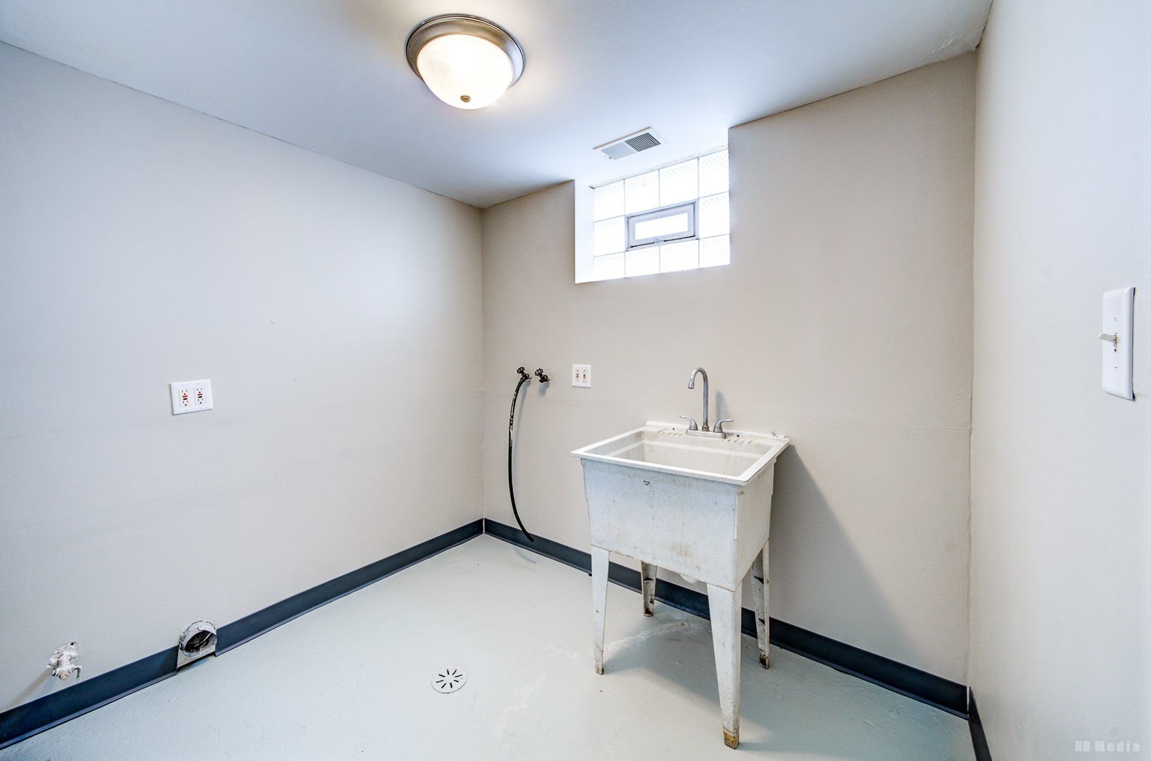 2223 West 156th Place Markham, IL 60426 - Photo 16 of 19 a view of a room that has a window and chair