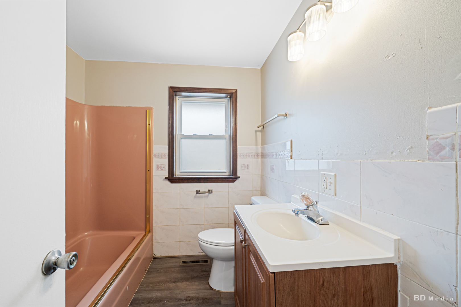 2223 West 156th Place Markham, IL 60426 - Photo 8 of 19 a bathroom with a sink a toilet and shower