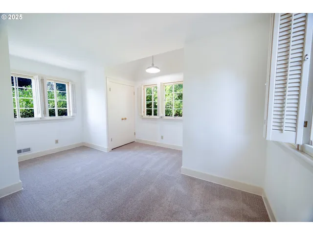 a view of an empty room with window