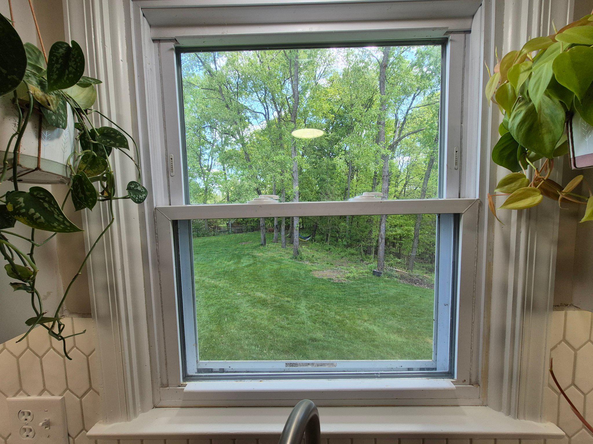 1406 Princeton Road Mechanicsburg, PA 17050 - Photo 20 of 53 a view of a garden from a window