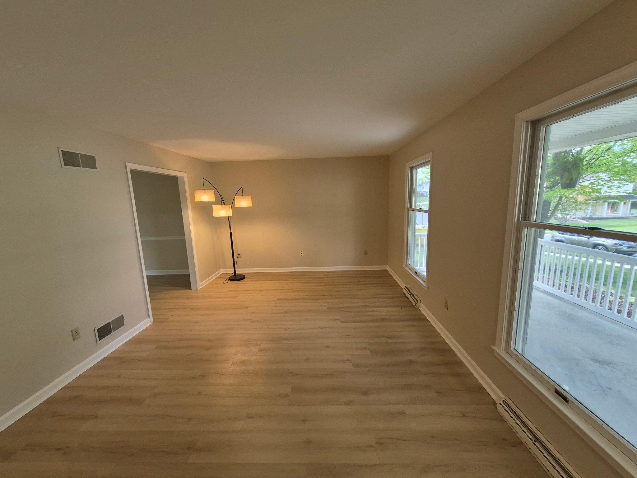 1406 Princeton Road Mechanicsburg, PA 17050 - Photo 23 of 53 a view of a room with wooden floor and a window