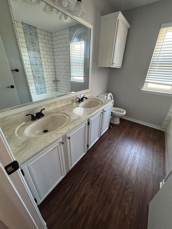 10025 Long Rifle Drive Fort Worth, TX 76108 - Photo 19 of 28 a large white kitchen with a sink window and a refrigerator
