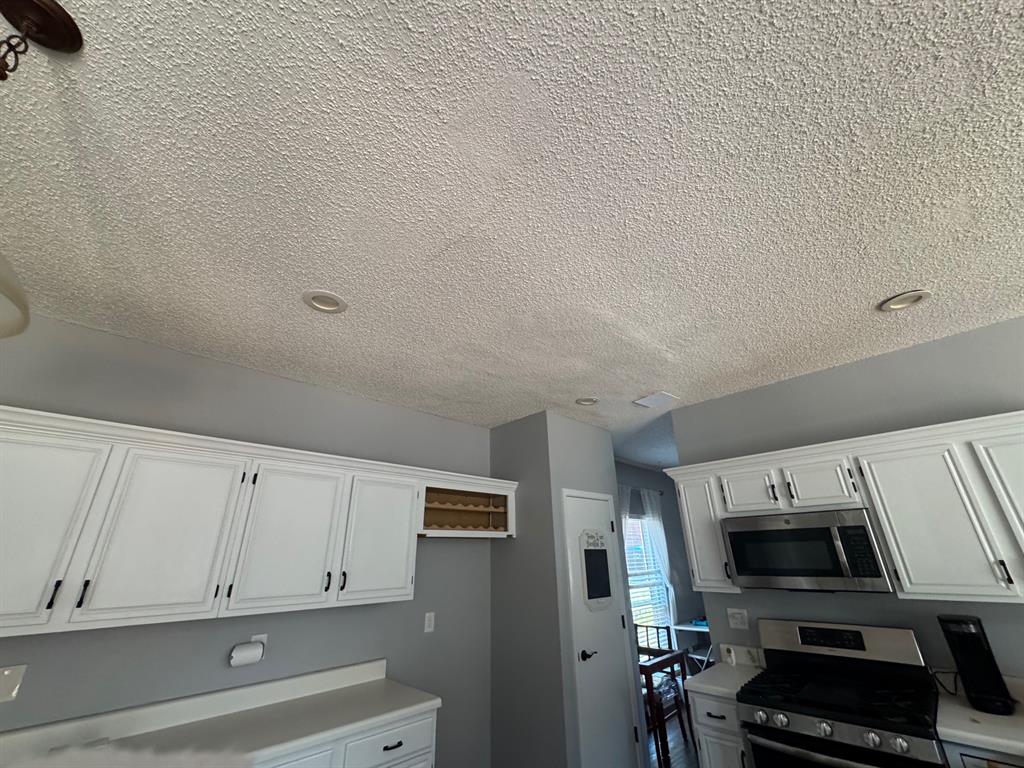 10025 Long Rifle Drive Fort Worth, TX 76108 - Photo 22 of 28 a view of a kitchen with electric appliances