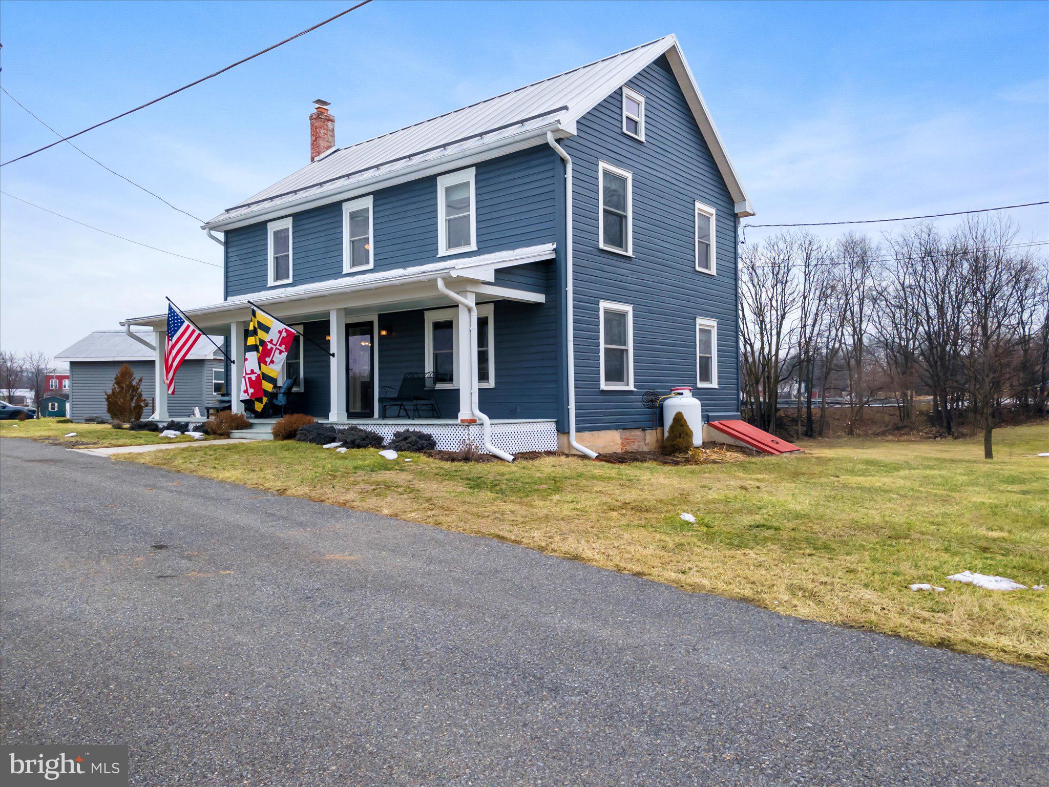 11853 White Hall Road Smithsburg, MD 21783 - Photo 2 of 40 a view of an house with backyard and porch