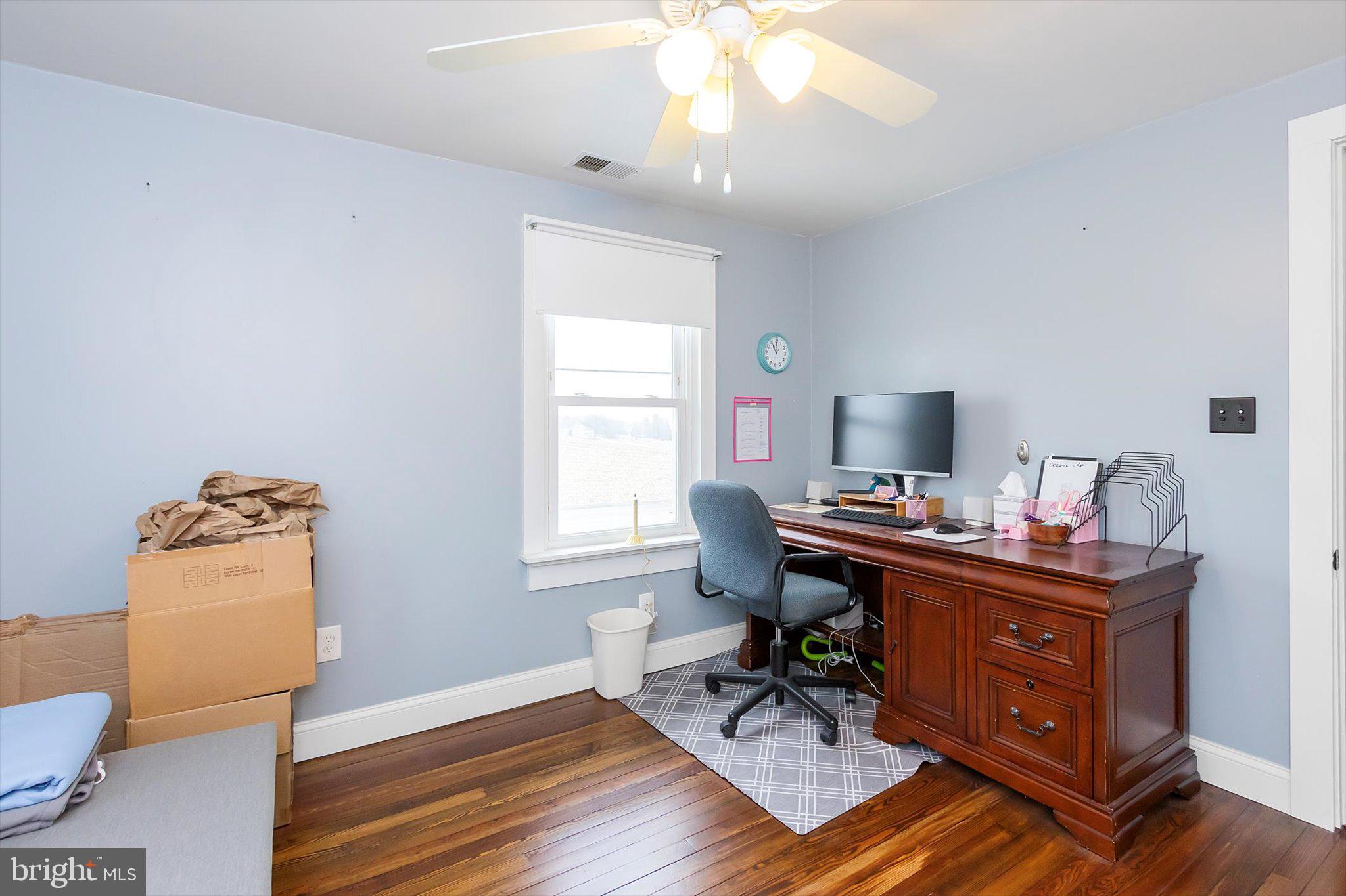 11853 White Hall Road Smithsburg, MD 21783 - Photo 24 of 40 a view of a workspace with furniture and a window