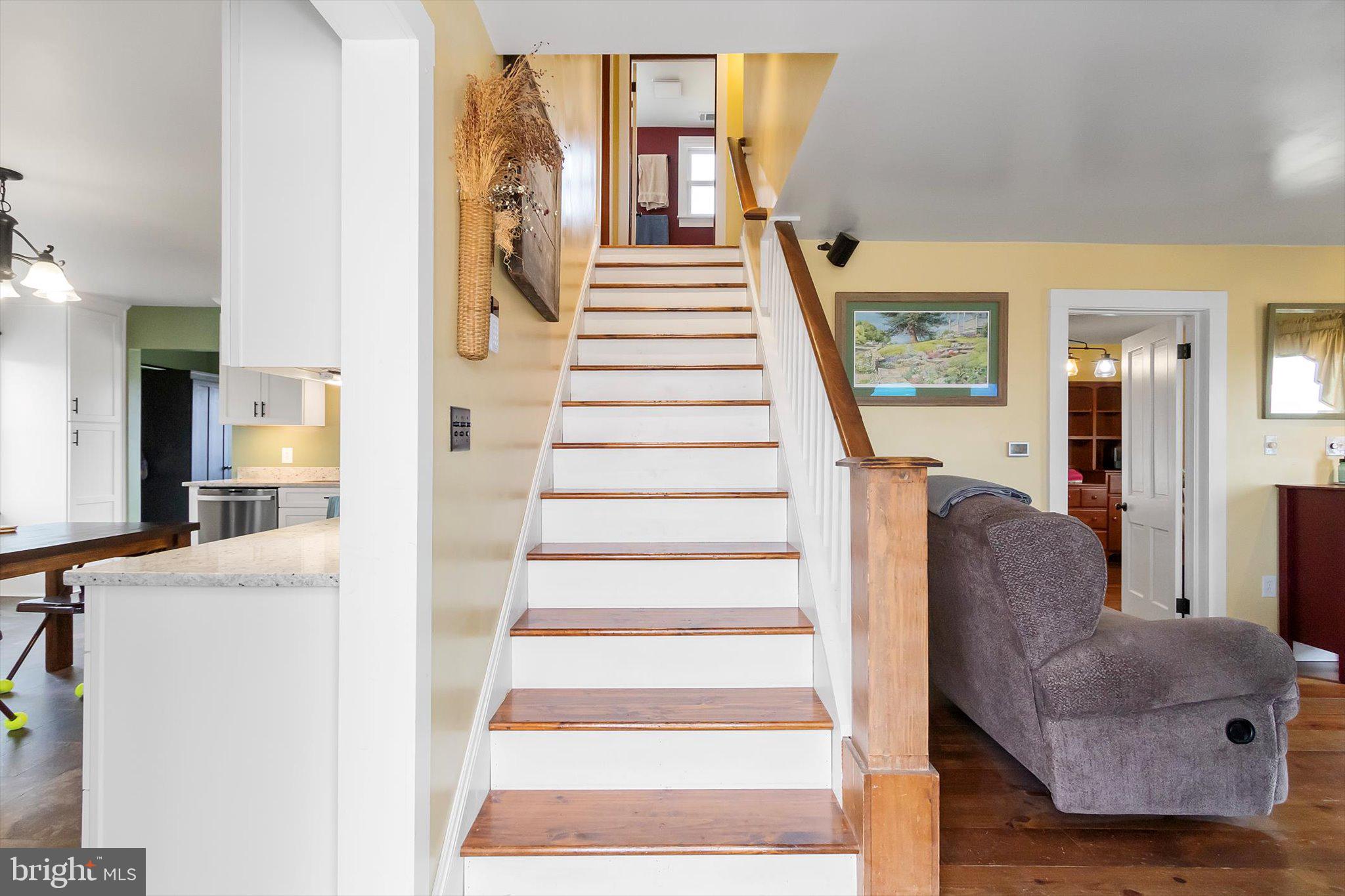 11853 White Hall Road Smithsburg, MD 21783 - Photo 3 of 40 a view of entryway and hall with wooden floor