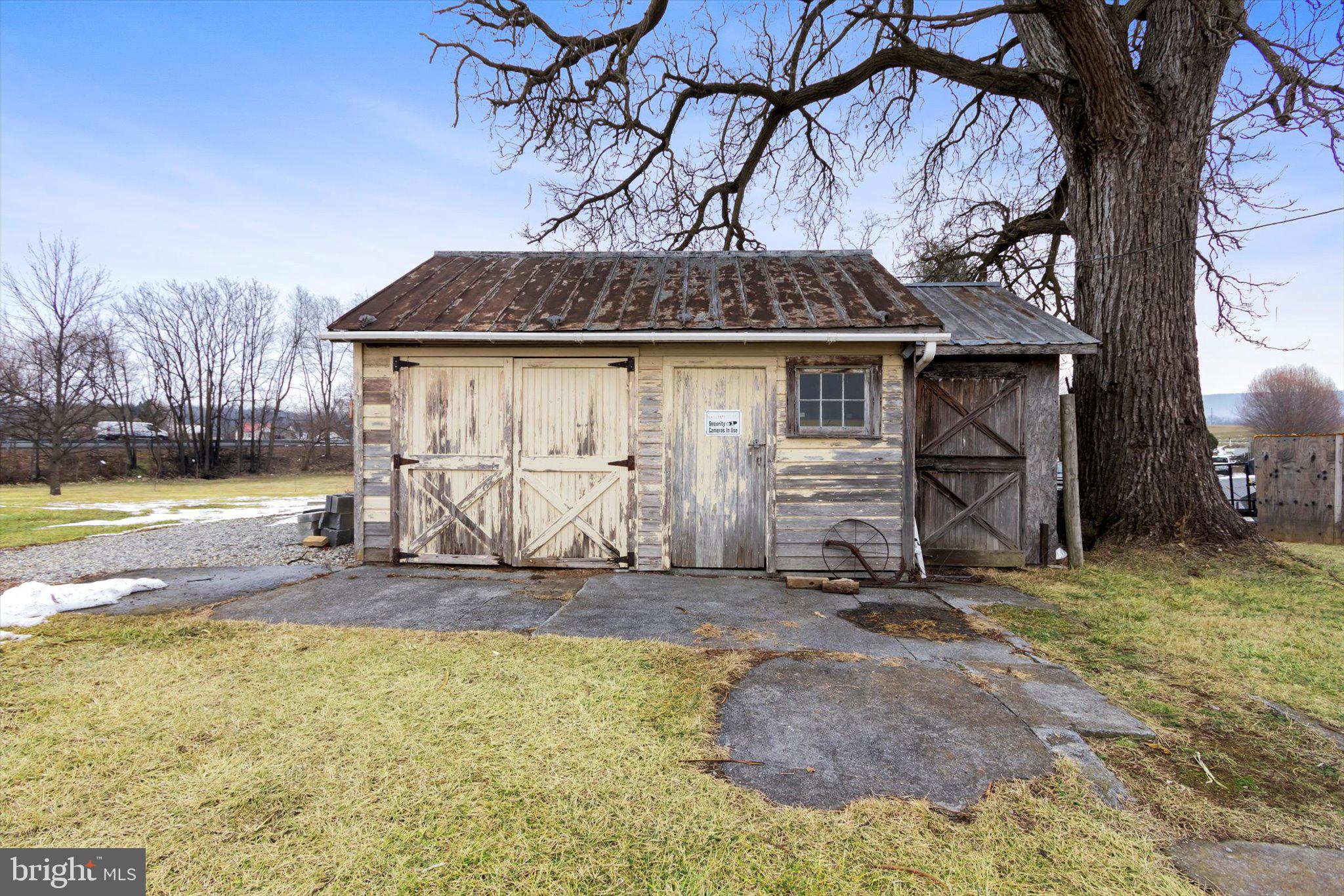 11853 White Hall Road Smithsburg, MD 21783 - Photo 36 of 40 a view of a backyard with a tree