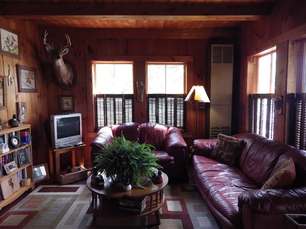 6 Gilman Loop Belgrade, ME 04917 - Photo 8 of 24 Living room with expansive views of...