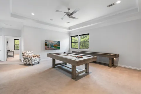 a living room with furniture and window