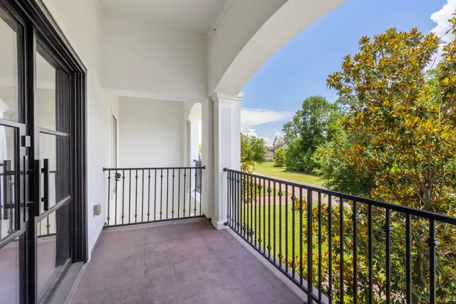 a view of a balcony with an outdoor space