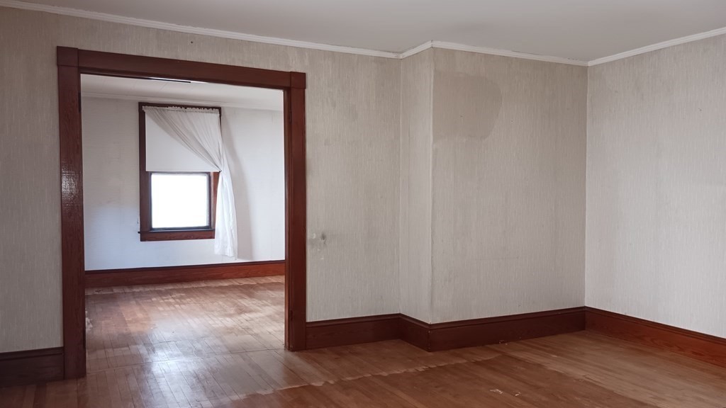 31 Orange Street Athol, MA 01331 - Photo 12 of 29 a view of an empty room with wooden floor and a window