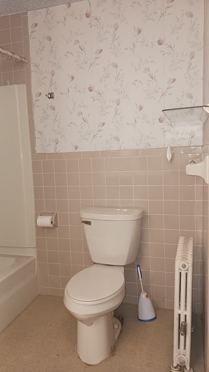 31 Orange Street Athol, MA 01331 - Photo 25 of 29 a bathroom with a toilet and a shower