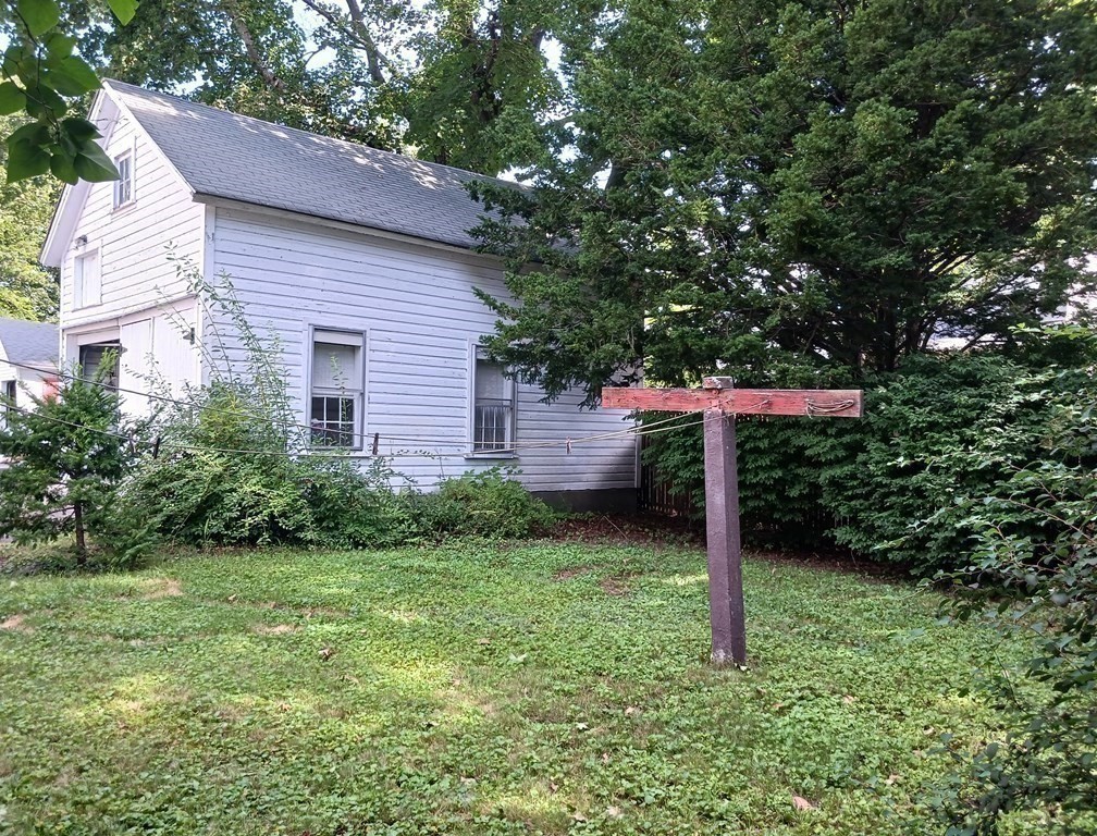 31 Orange Street Athol, MA 01331 - Photo 28 of 29 a backyard of a house with a table and plants