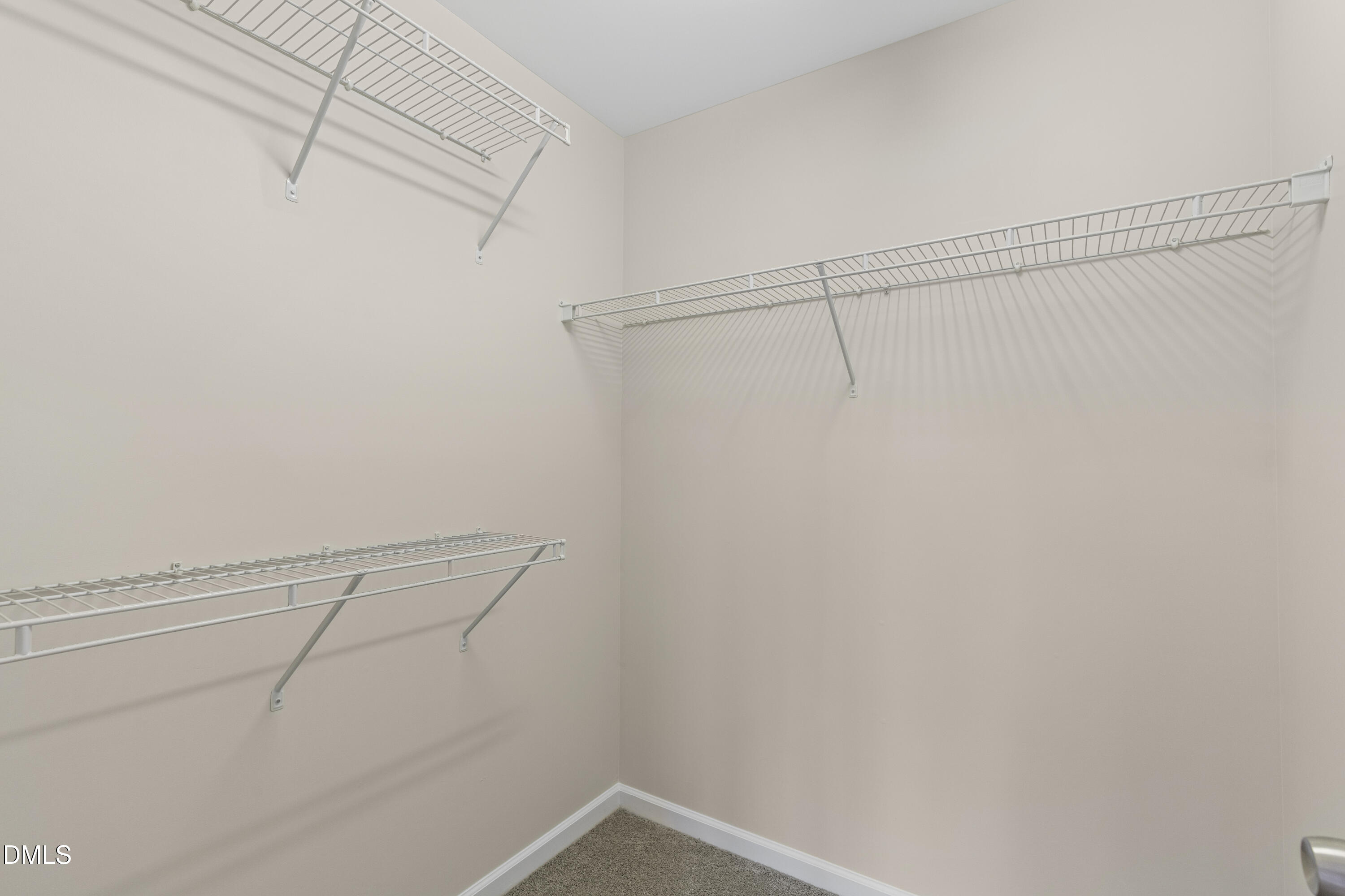 6013 San Marcos Way Raleigh, NC 27616 - Photo 15 of 21 a view of a room with racks on the wall