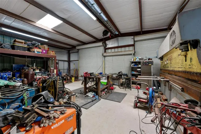 a view of a storage room with furniture