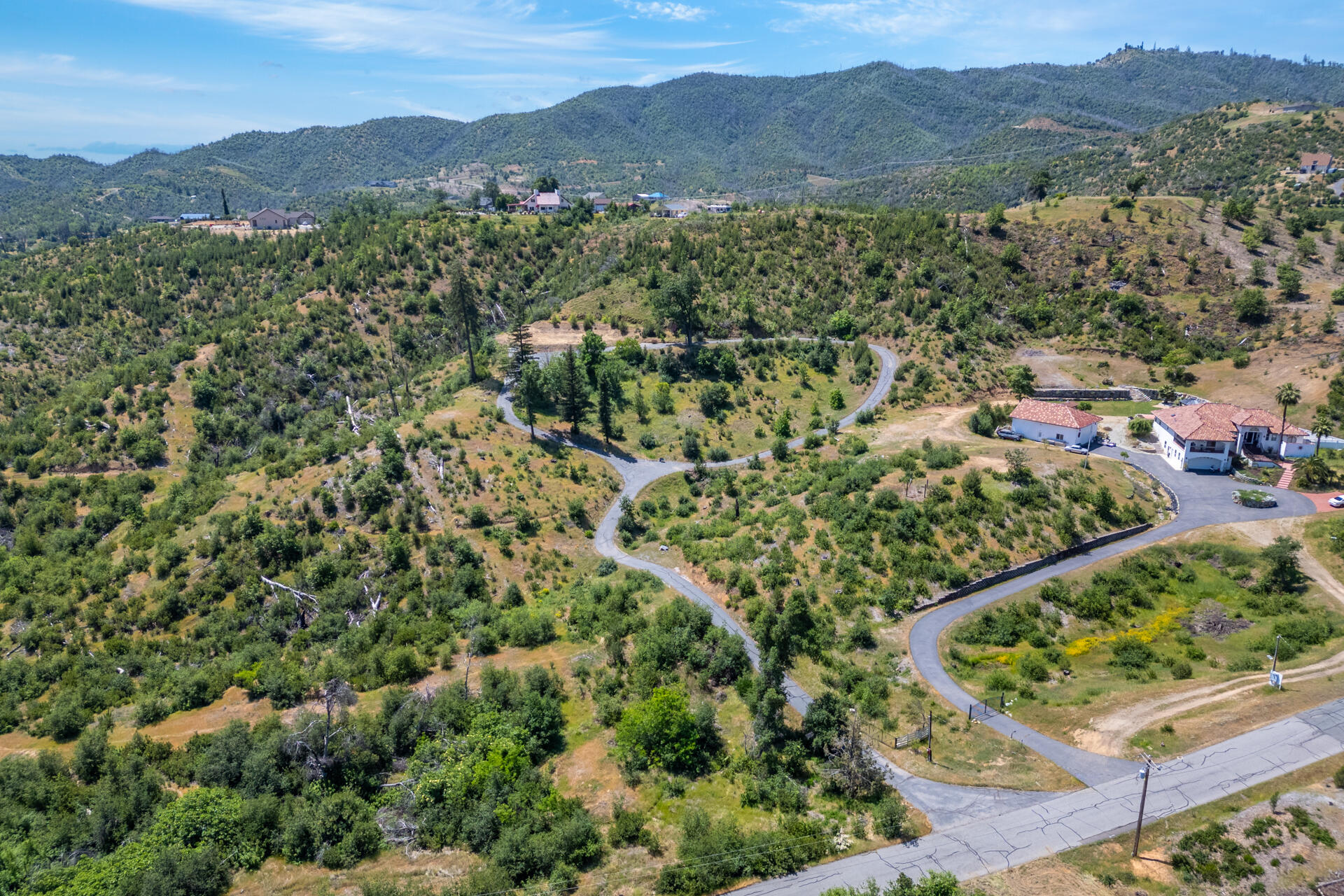 15691 Old Stage Coach Road Redding, CA 96001 - Photo 2 of 27 an aerial view of houses covered in trees