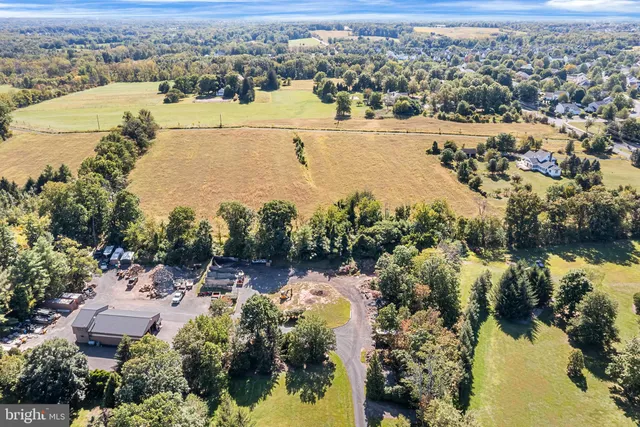 an aerial view of residential building and ocean