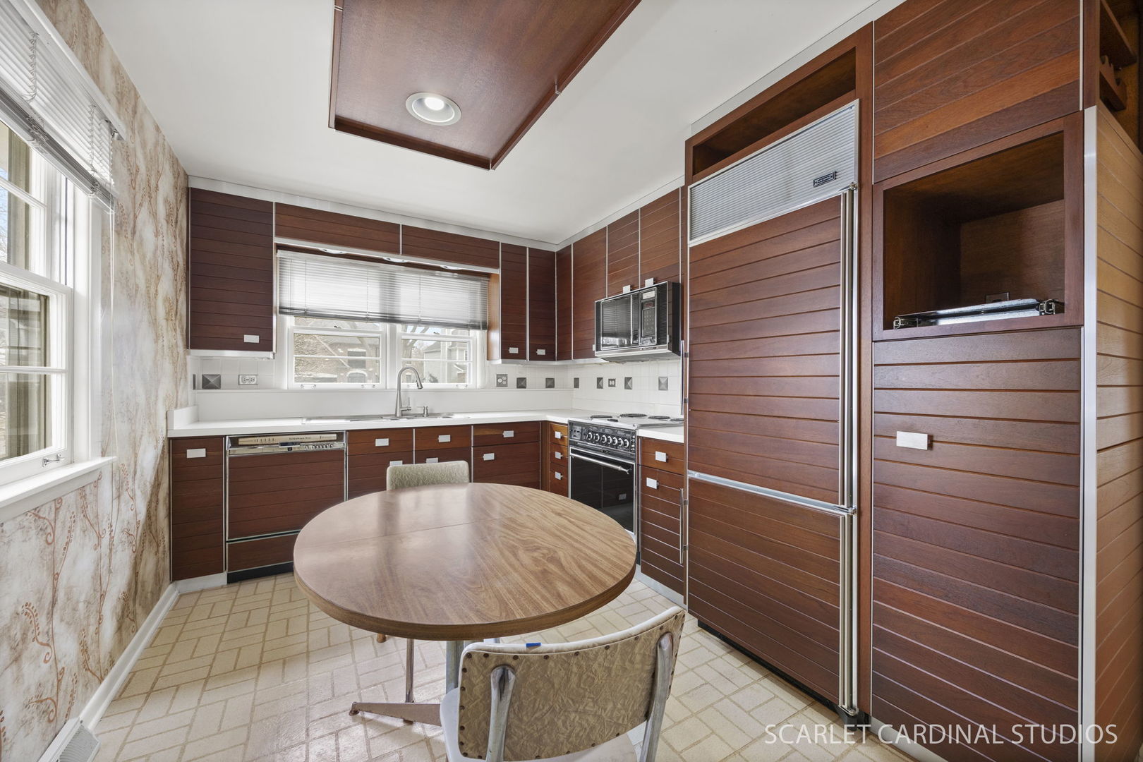110 Travers Avenue Wheaton, IL 60187 - Photo 4 of 15 a bathroom with a sink a mirror and shower