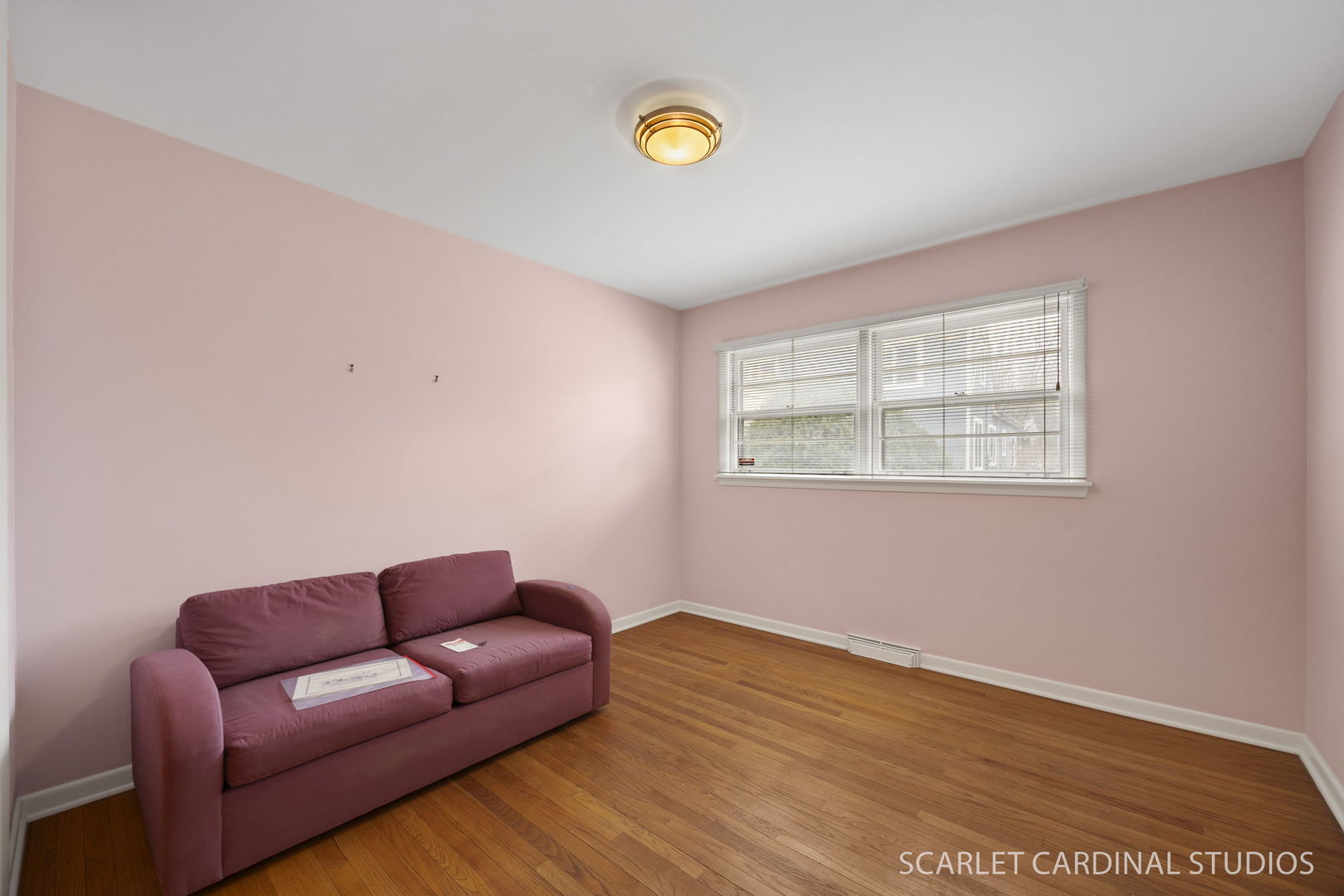 110 Travers Avenue Wheaton, IL 60187 - Photo 8 of 15 a view of a livingroom with furniture and wooden floor