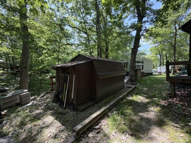 2795 East 28th Road Marseilles, IL 61341 - Photo 20 of 63 a view of backyard with barbeque and trees