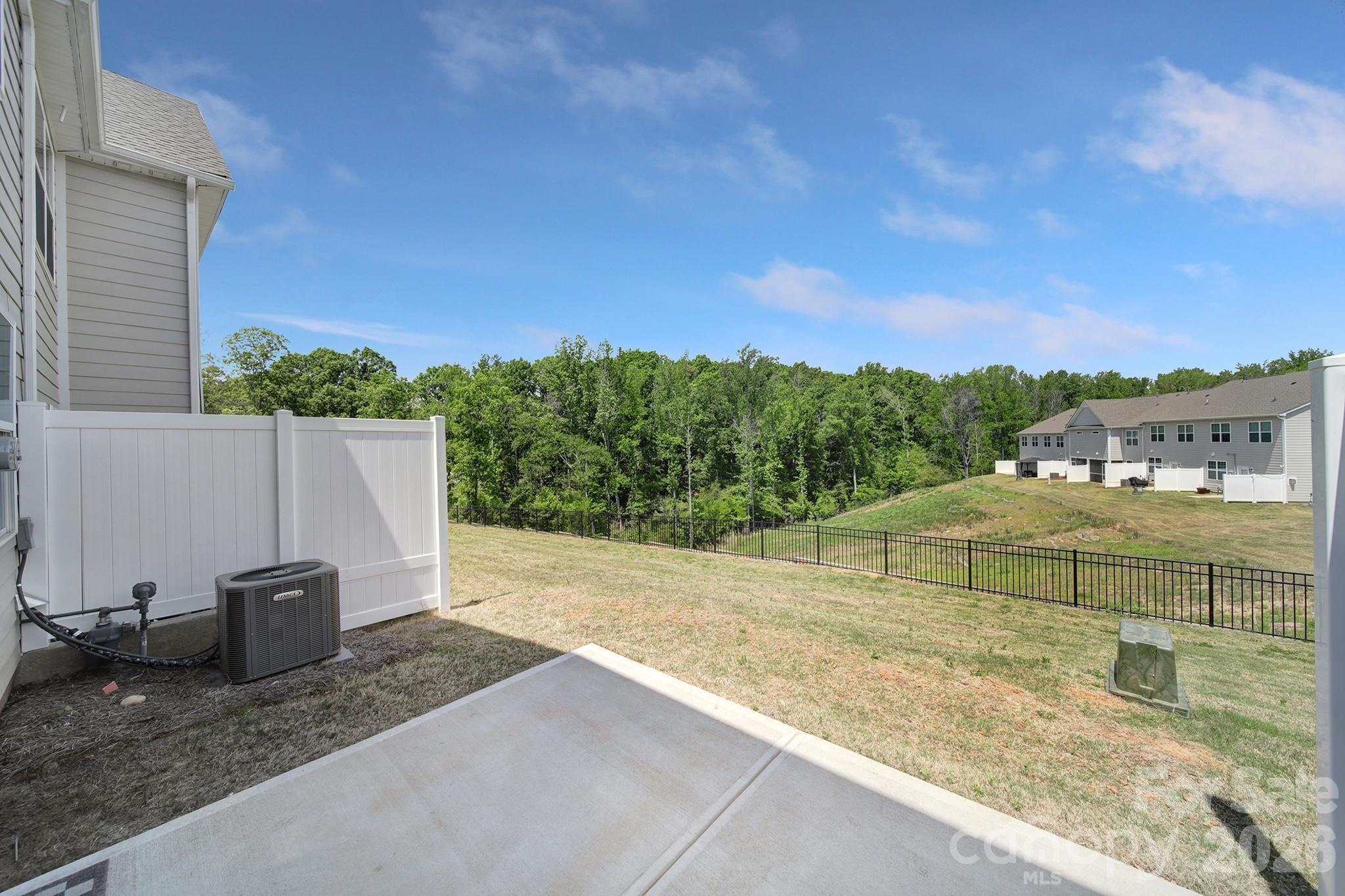 8042 Scarlet Maple Lane Fort Mill, SC 29708 - Photo 28 of 37 a view of a backyard