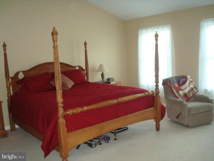 20115 Gunpowder Road Manchester, MD 21102 - Photo 12 of 29 a bedroom with a bed chair and window