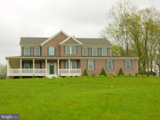 20115 Gunpowder Road Manchester, MD 21102 - Photo 18 of 29 a big house with a big yard and large trees
