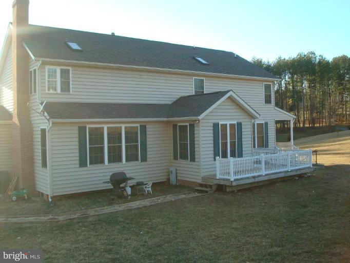 20115 Gunpowder Road Manchester, MD 21102 - Photo 20 of 29 a front view of a house with a yard