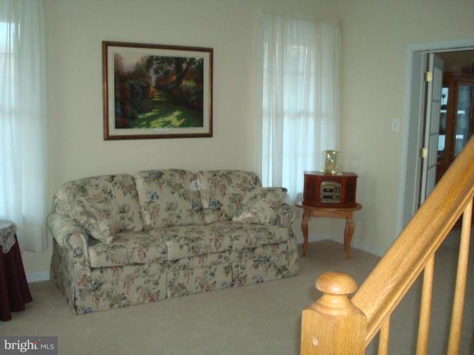 20115 Gunpowder Road Manchester, MD 21102 - Photo 24 of 29 a living room with furniture and a painting on the wall