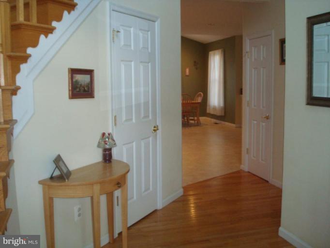 20115 Gunpowder Road Manchester, MD 21102 - Photo 9 of 29 a view of a hallway with wooden floor