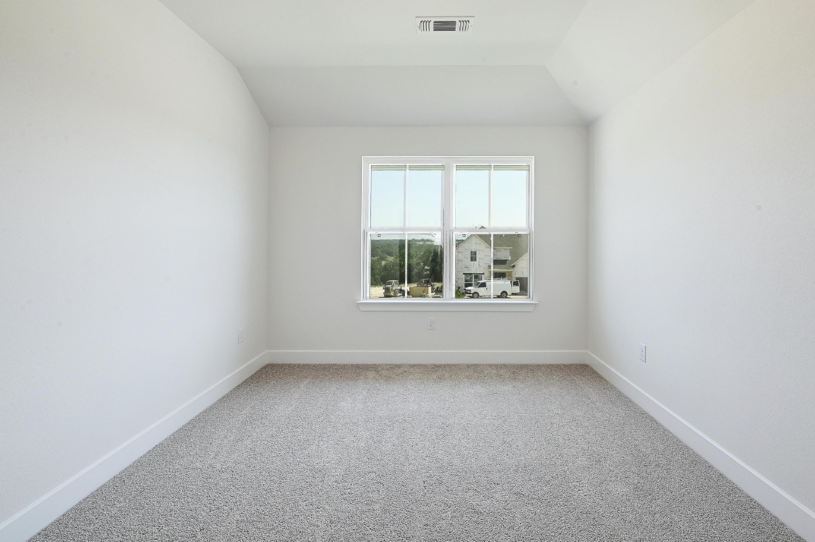 256 Star Rush Trail Georgetown, TX 78633 - Photo 15 of 23 an empty room with a window