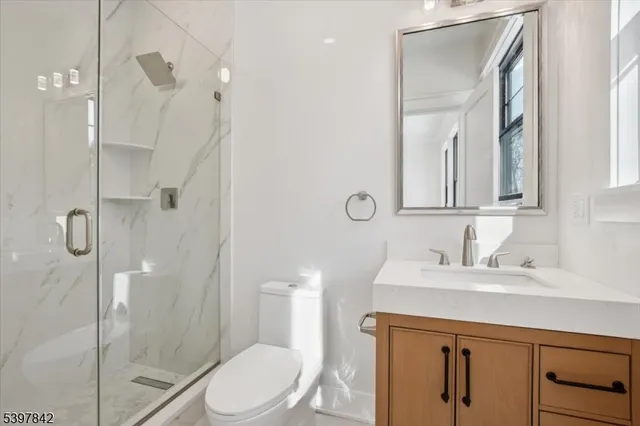 a spacious bathroom with a bathtub and shower