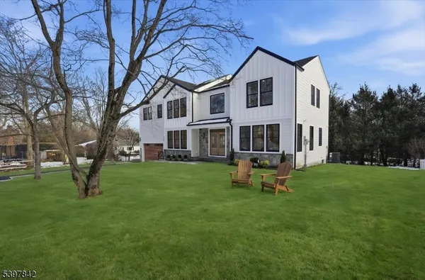 a house view with a garden space