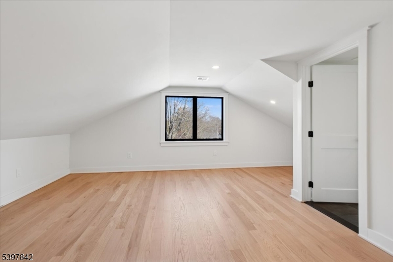 32 Felch Road Florham Park, NJ 07932 - Photo 31 of 45 an empty room with wooden floor and windows
