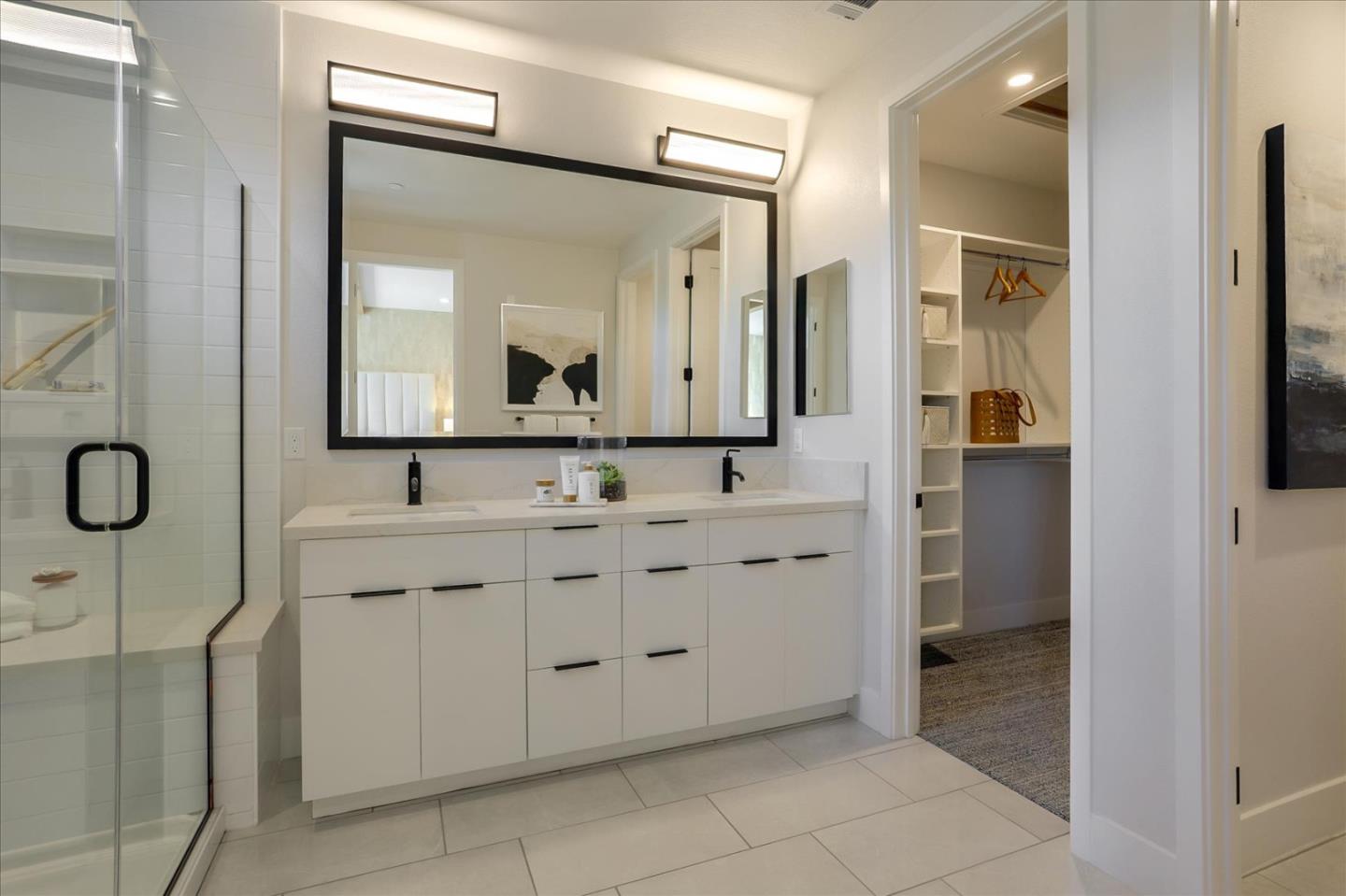 1323 West Middlefield Road Mountain View, CA 94043 - Photo 23 of 30 a spacious bathroom with a double vanity sink and a mirror