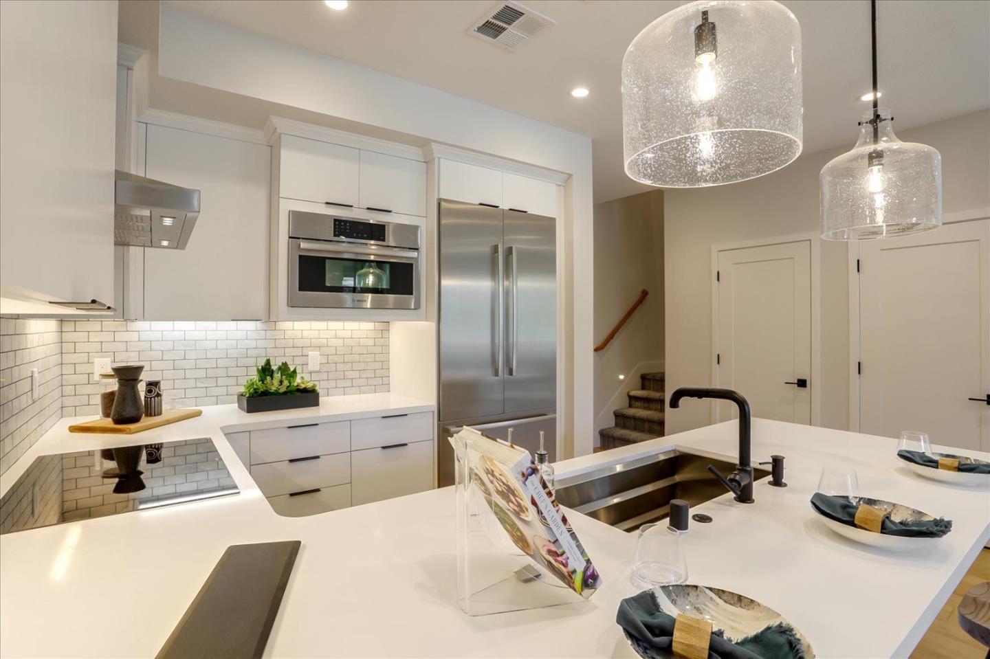 1323 West Middlefield Road Mountain View, CA 94043 - Photo 8 of 30 a kitchen with a sink stove and refrigerator