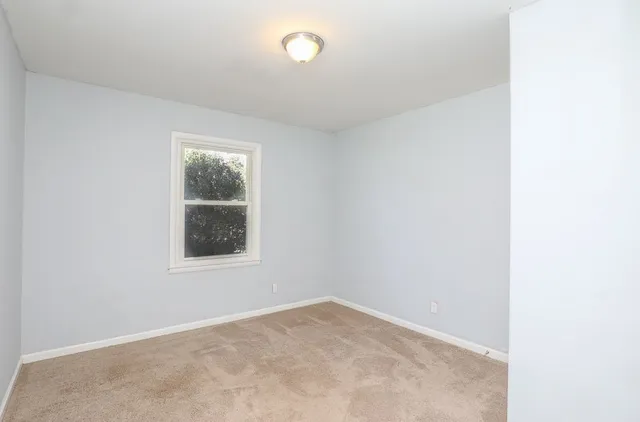 an empty room with a window