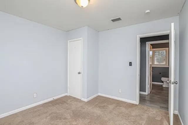 an empty room with closet