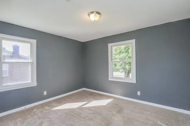 an empty room with a window