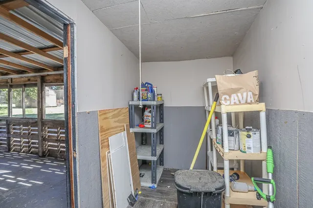 a room with furniture and a wooden floor