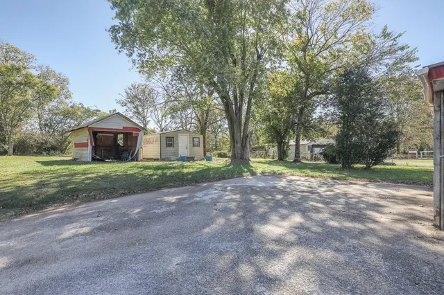 a house with trees in front of it