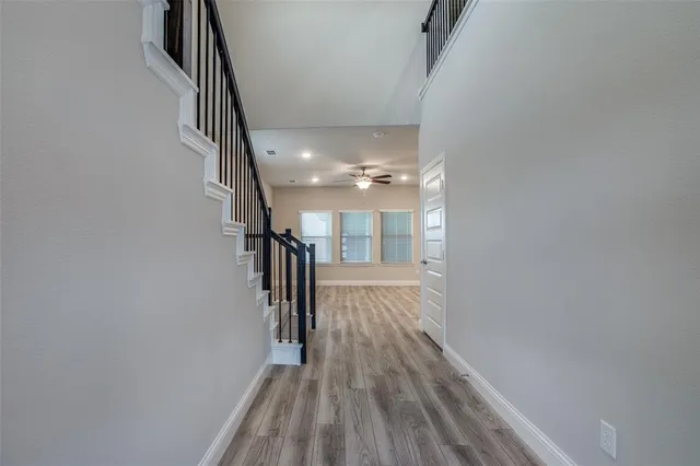 a view of hallway with stairs